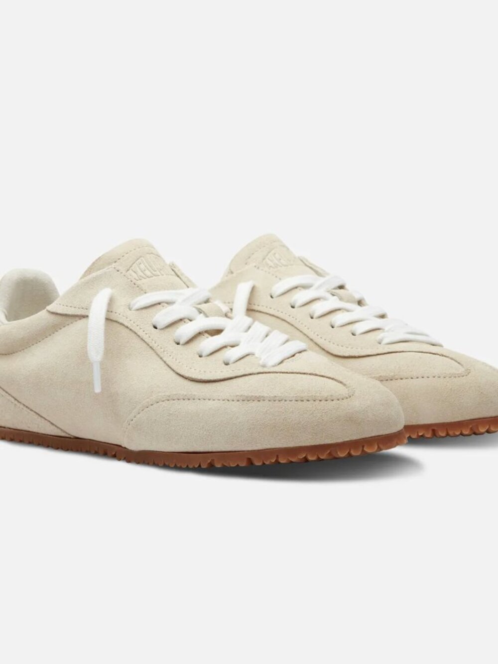 Axel Arigato beige sneakers